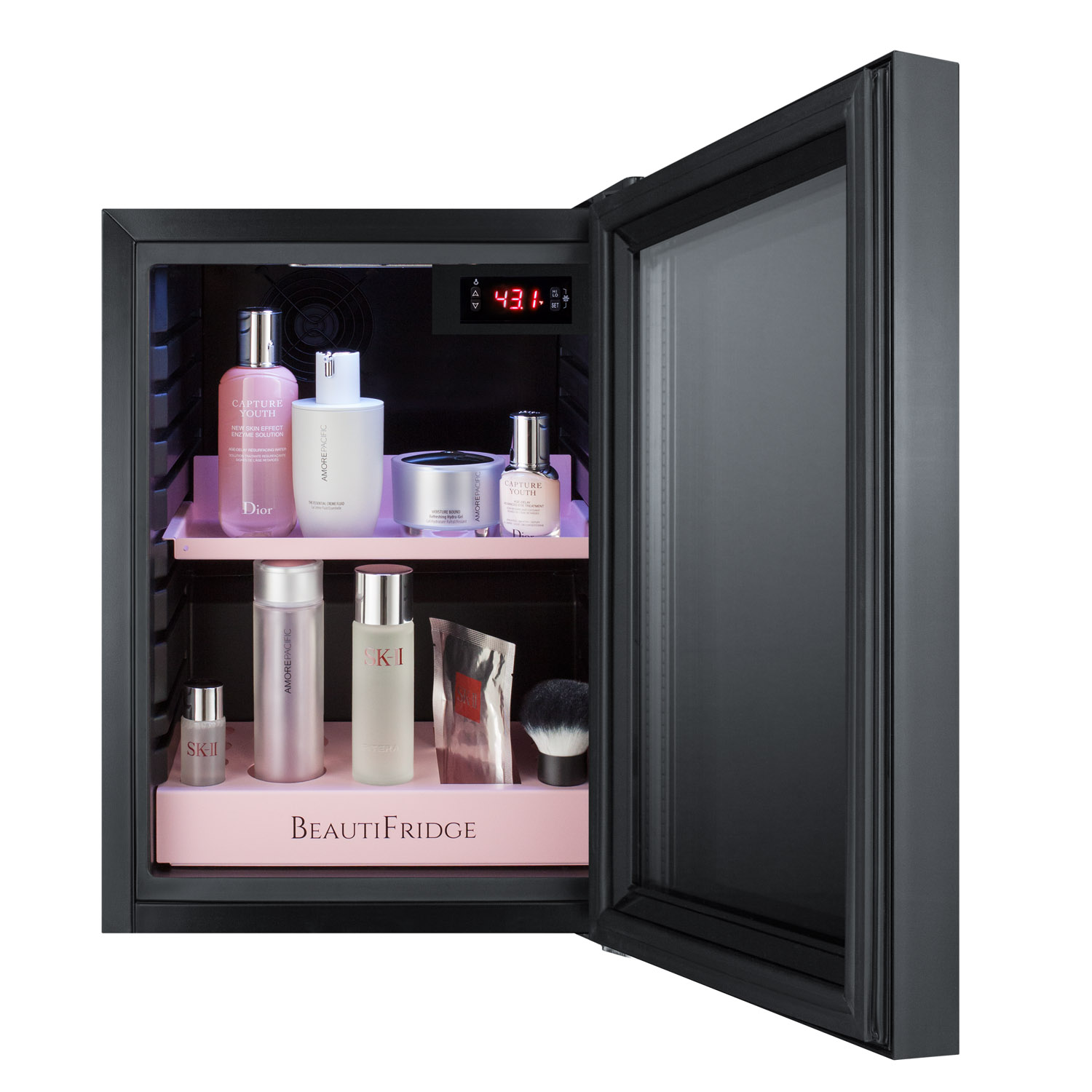 BeautiFridge compact cosmetics cooler with mirror-tinted glass door, black cabinet, lock, matte blush pink shelves, and digital controls set for the storage of beauty products